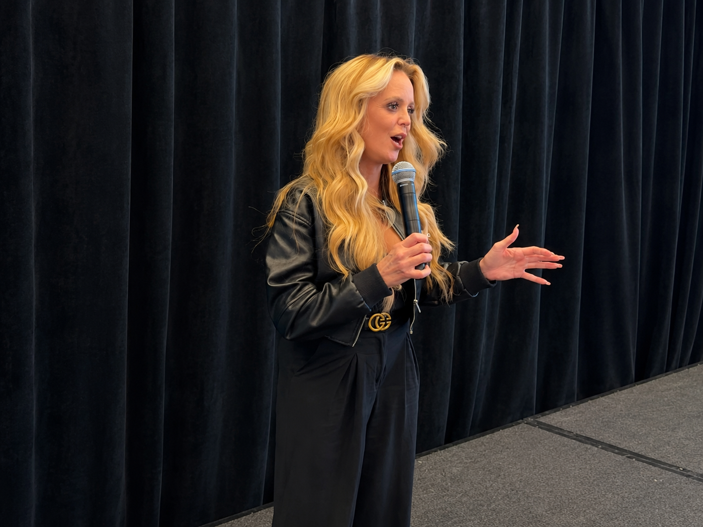 Bobbi Higgins speaking — speaking on stage